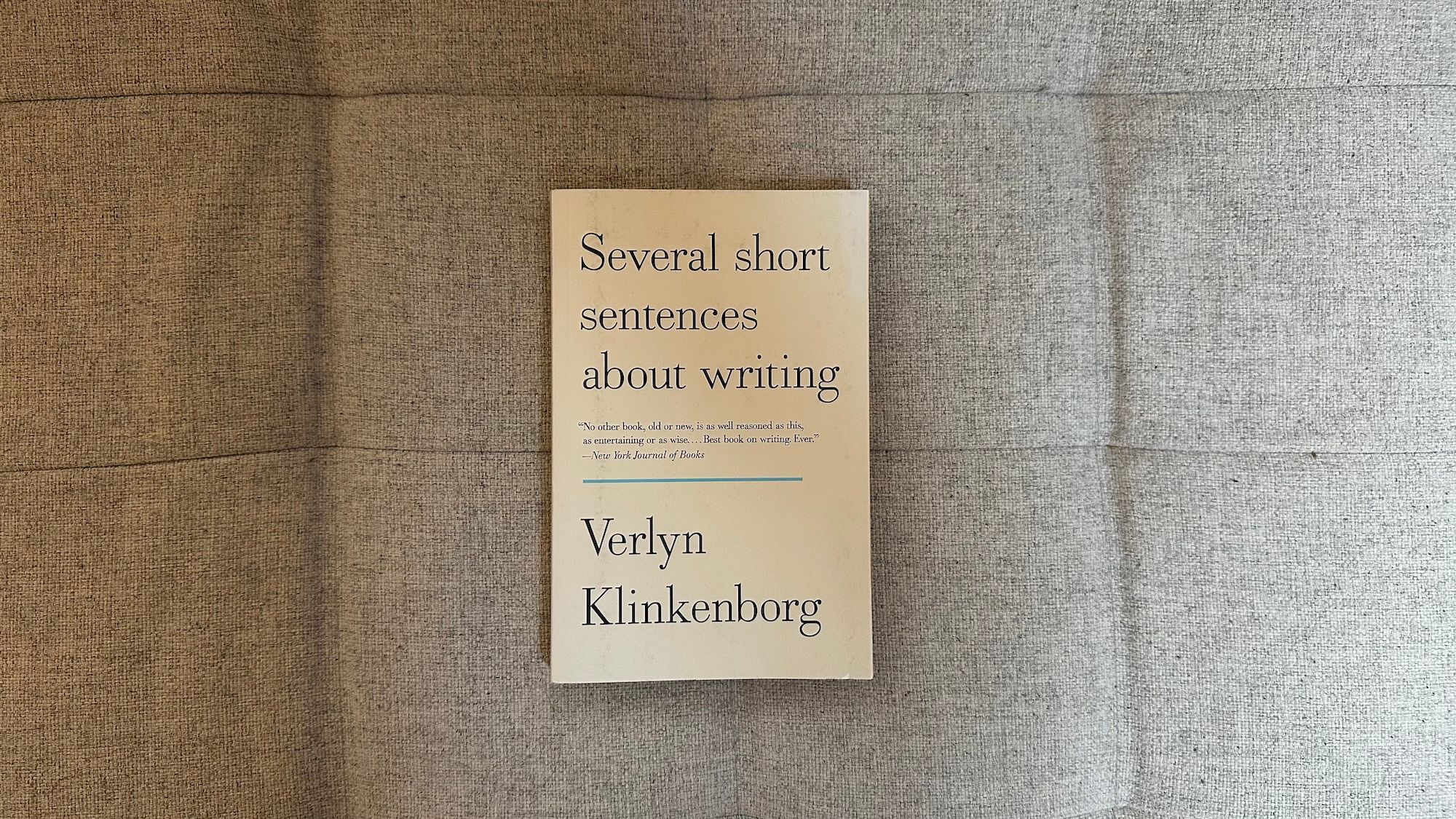Book "Several short sentences about writing" by Verlyn Klinkenborg laying on my couch.