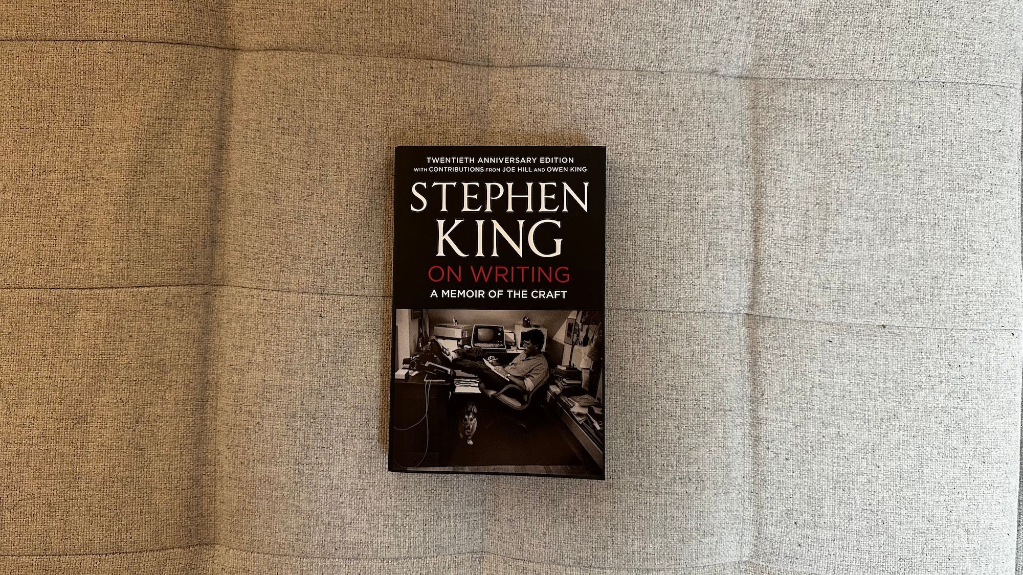 Book "ON WRITING" by Stephen King laying on my couch.